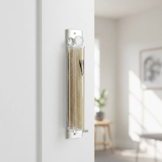 Crystal Mezuzah Case with Gold Design – crystal mezuzah case displayed on a wall
