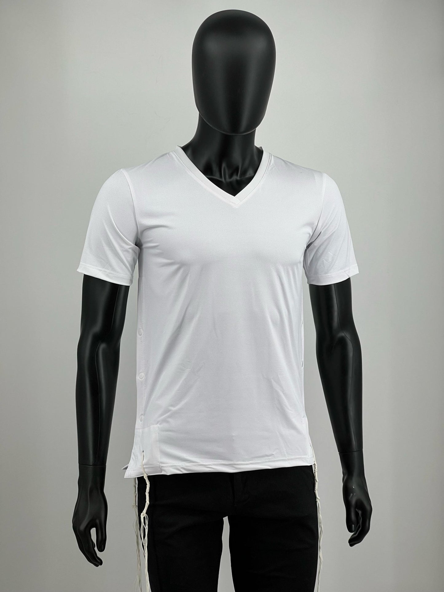 A white Tzitzit T-Shirt displayed on a black mannequin, featuring a V-neck design.