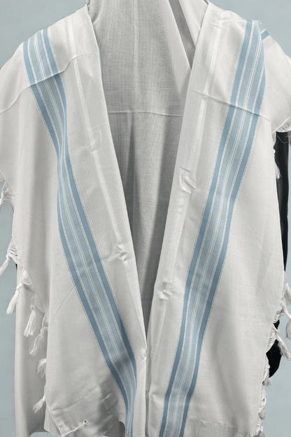 White Tallit Chatanim with blue stripes and tassels on a light gray background