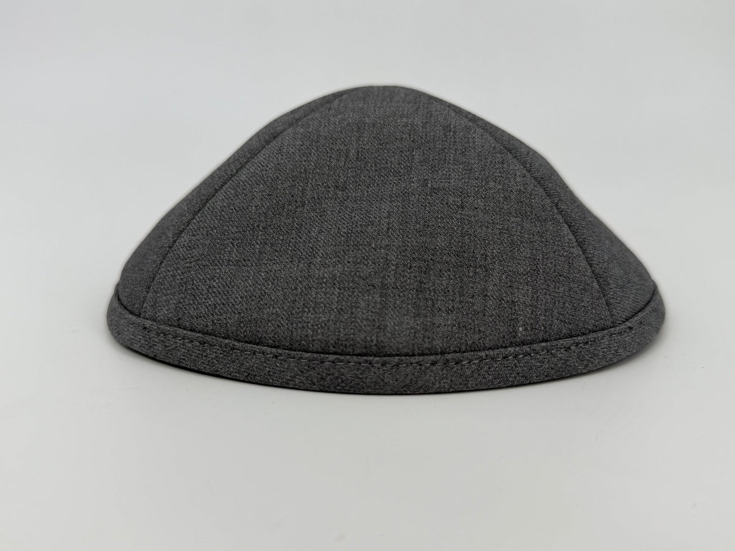 Gray fabric skullcap on a light gray background