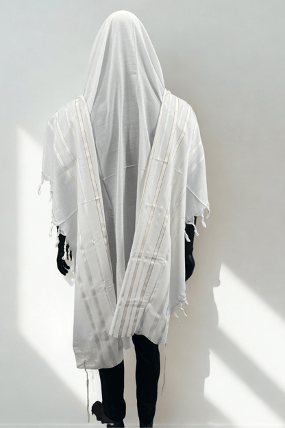 mannequin wearing a white Acrylic Tallit Chatanim with gold stripes, draped with a hood. The tallit features kosher tzitzit