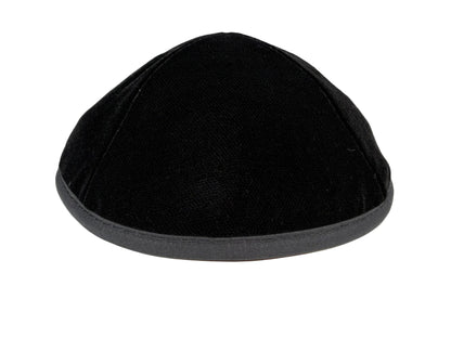 Black kippah on a white background