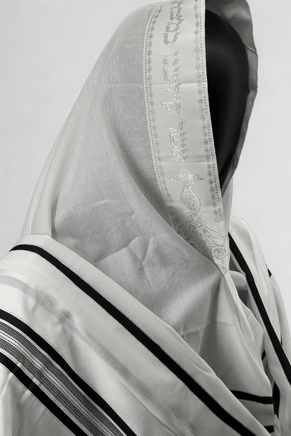Close-up side view of a white Acrylic Tallit Chatanim with  black stripes and an embroidered atara (neckband)