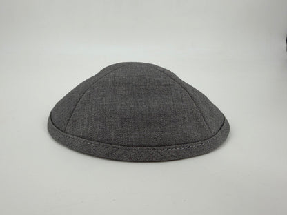 Gray kippah on a light gray background