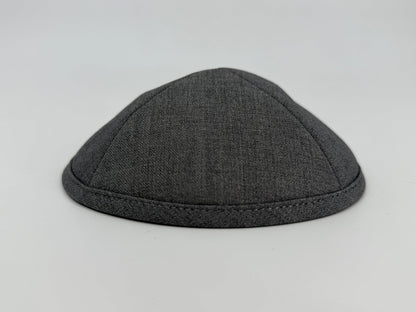 Gray kippah on a light gray background