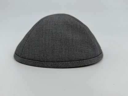 Gray fabric cap on a light gray background