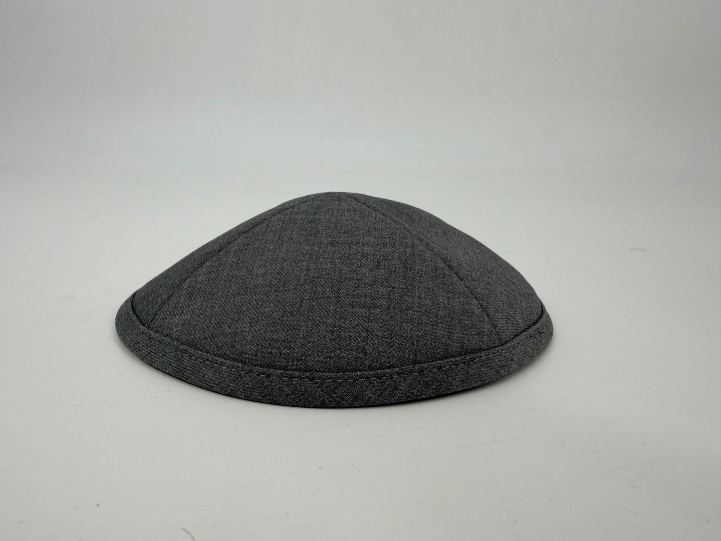 Gray flat cap on a light gray background