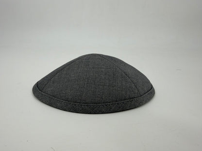 Gray flat cap on a light gray background