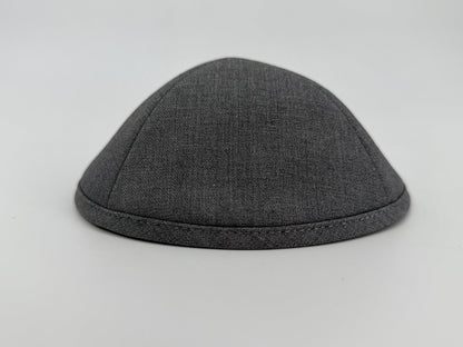 Gray kippah on a light gray background