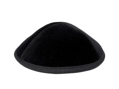 Black kippah on a white background