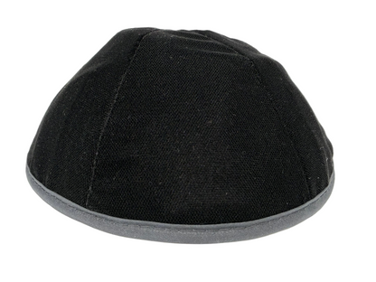 Black kippah on a white background
