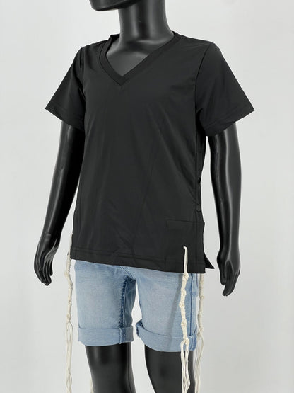Mannequin wearing a black V-neck short-sleeve Tzitzit T-shirt with white fringes (Tzitzit) hanging from the corners, paired with light blue denim shorts. The garment is styled in accordance with traditional Jewish customs. Displayed against a plain light background.