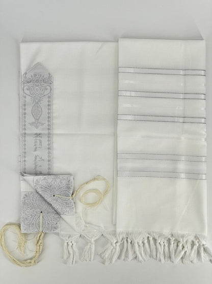 Flat-lay image of a white Acrylic Tallit Chatanim with silver stripes and silver decorative elements.